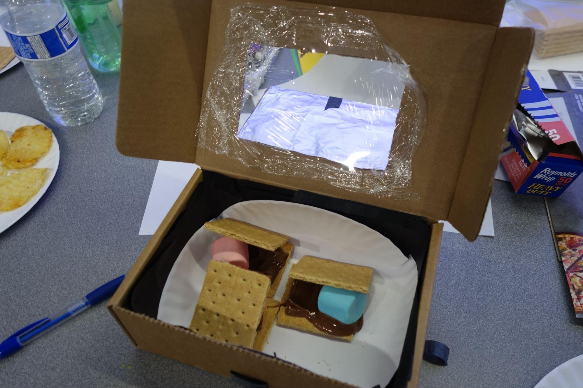 Smores bake inside the solar oven